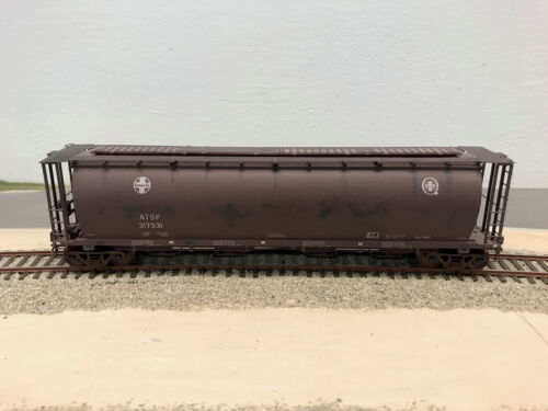 ATSF #317531 is a Ga-907 class grain car. It was made from an undecorated Intermountain kit. I added a Plano etched metal roof walk and Athearn working roller bearing trucks. Microscale decals were used to finish the model. Thomas Cain model and photo. ATSF Ga-907 #317531 grain car (model)