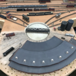This photo shows drone footage of the engine service facilities and approach tracks on Bill Van der Meer's Sweetwater & Orient #2. Bill Van der Meer photo. Model engine facility
