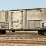 A model of a Santa Fe We-86 M-o-W boxcar. This model started from a Westerfield BX-11/12 resin kit. It has scratchbuilt sides and doors and full underbody brake rigging.
About the Prototype details: It started from a BX-12 class car, with Transco Ribbed sides and grain doors and there were only 50 cars in the class. They were retired from regular service in the early 80's and a few of them became MOW Tool cars in the WE-86 class and painted silver. This particular one was assigned to Albuquerque and I managed to catch a photo of it in Vaughn, NM in Sept of 1995. It probably wasn't long for the world at that time. I had been searching for one of these kits for quite a while and finally scored one from a fellow ATSF modeler that just happened to have an extra in his stash. (Thank you again Steve Sandifer!) This model won a ribbon and a Presidents award and Certificate of Technical Excellence at the Albuquerque Convention in 2024.